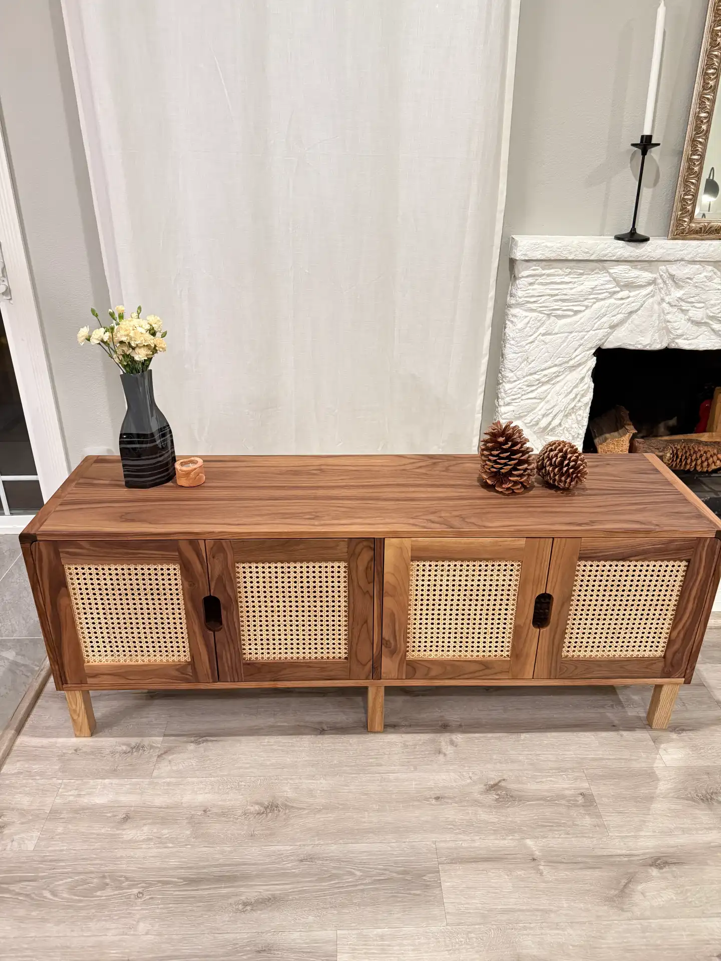 Minimal Lines, Warm Walnut Grain, and Handwoven Cane Doors